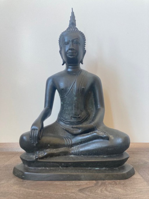 Thai bronze seated Buddha sculpture, earth-touching gesture. 