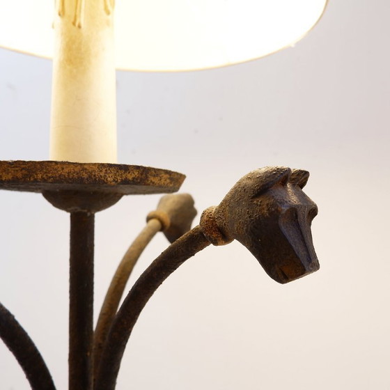 Image 1 of Wrought-iron tripod floor lamp adorned with stylized animal heads