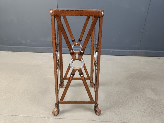 Image 1 of tavolino in ferro in ecopelle attribuito a jacques Adnet, anni '70