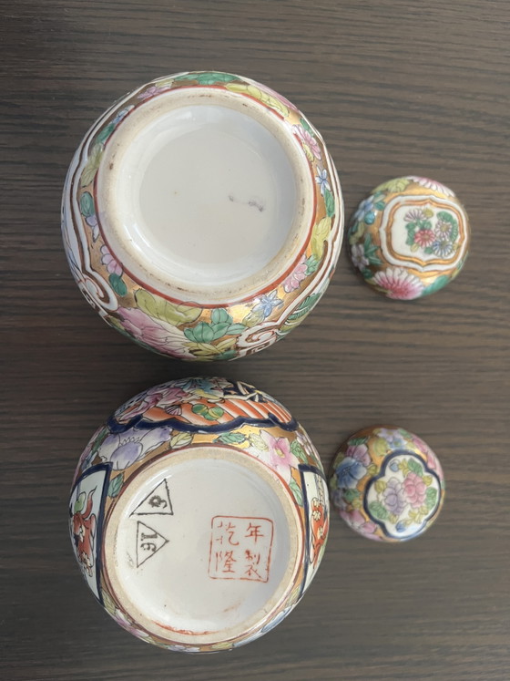 Image 1 of Set of 2 Japanese hand-painted Kutani ginger jars with lids and wooden feet