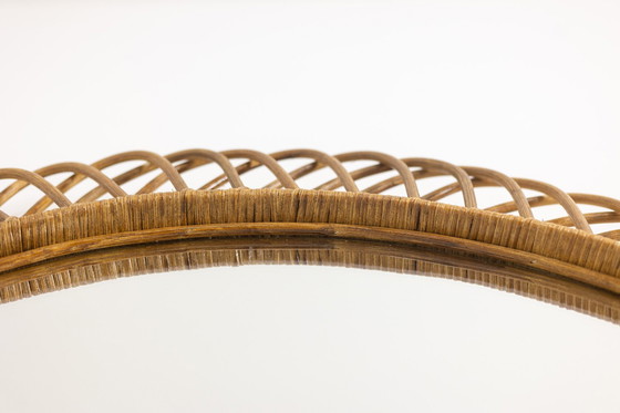 Image 1 of Pair of Round Wicker Mirrors with Interlacing. Circa 1980.