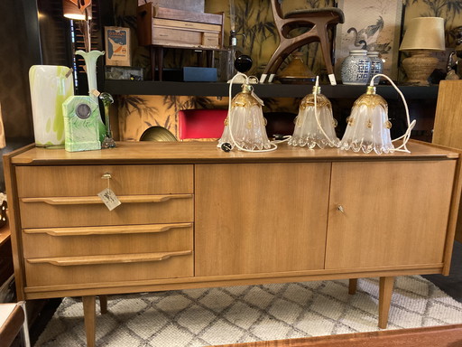 Lowboard/dresser in teak sleek lines with special details