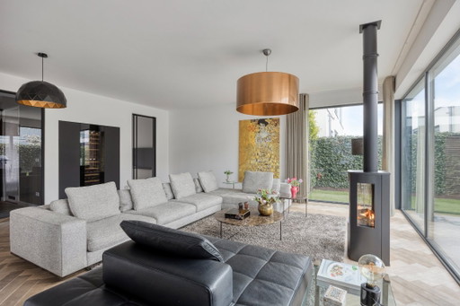 Minotti Lawrence Clan Ecksofa inkl. Leder-Pouf/Ottomane