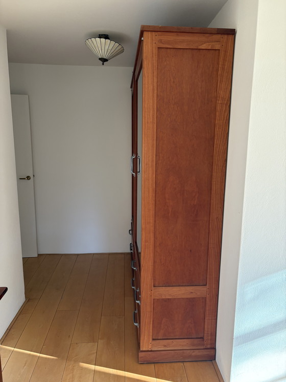 Image 1 of Elegant Cherry Display Cabinet with Drawers and Glass Doors