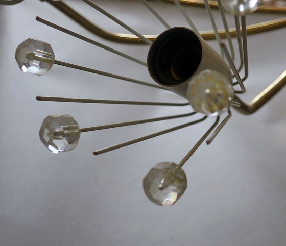 Image 1 of Elliptische kroonluchter met 10 armen van messing en glas, jaren 1950