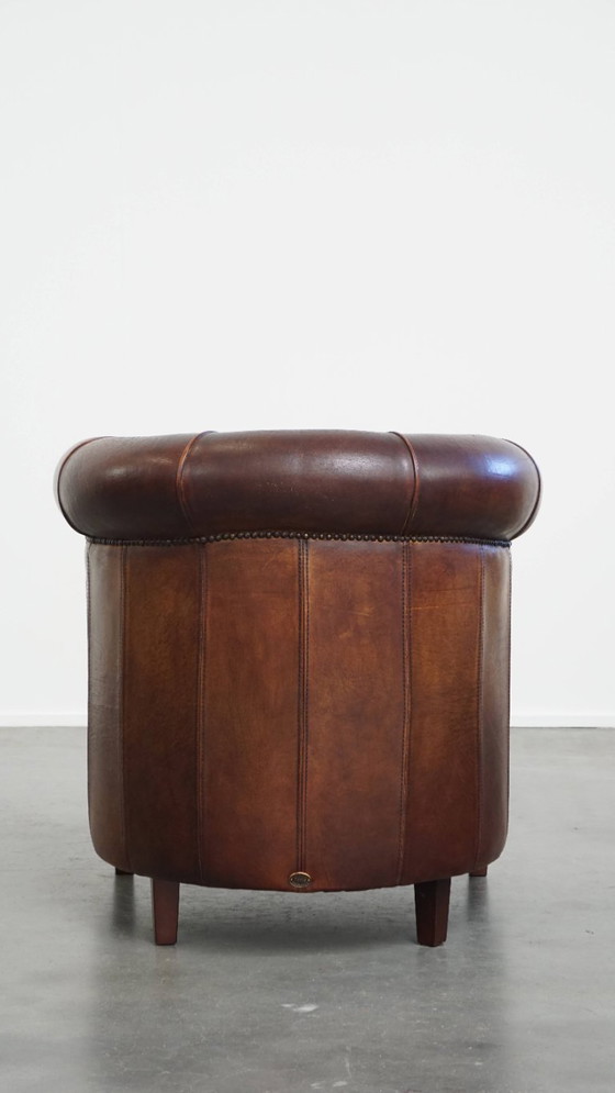 Image 1 of Sheep Leather Club Chair in a Dark Cognac Color