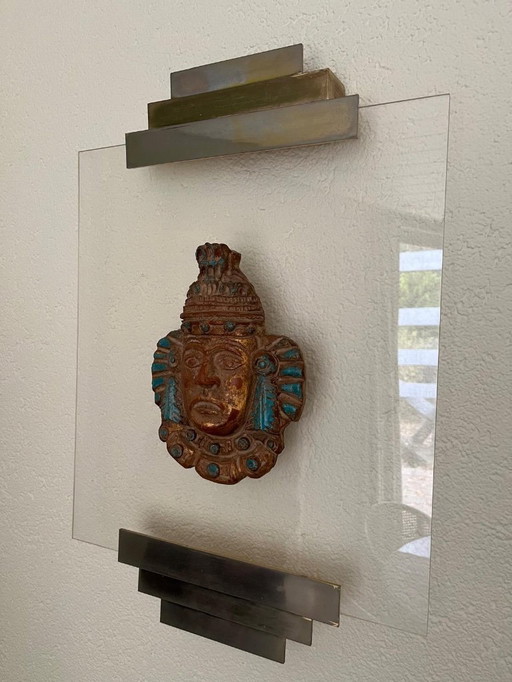 Lampada da parete con testa azteca