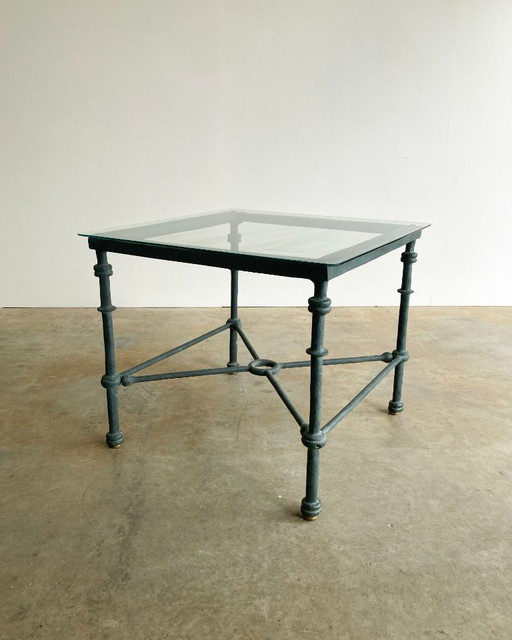 Vintage sculptural metal coffee table with a patina finish