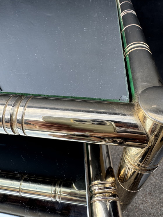 Image 1 of Nesting tables in gold-tone metal, bamboo, and mirror, 1970s style