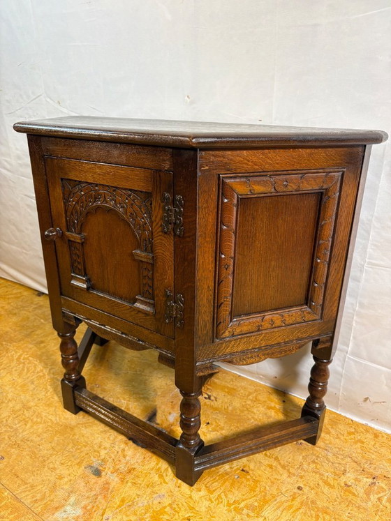 Image 1 of Vintage Old Charm Furniture Canted Side Cabinet by Wood Brothers (Circa 1970)  A charming and beautifully crafted vintage canted