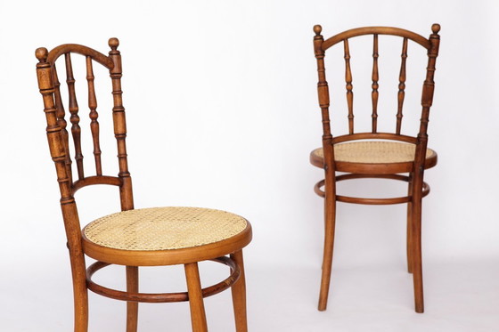 Image 1 of Set van 4 Josef Kohn gebogen houten stoelen – Oostenrijkse vintage jaren 30-50, beukenhout met Weense rieten zittingen, Thonet-s