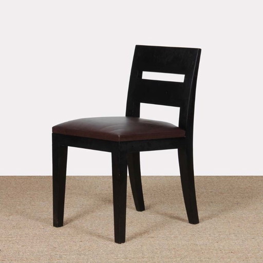 Silla modelo Archipel en piel, diseñada por Christian Liaigre en 1994.