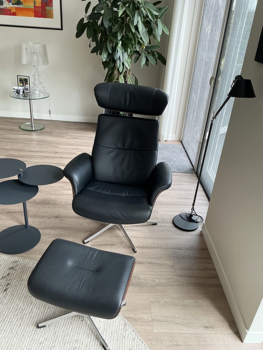 Time-Out swivel armchair with footstool