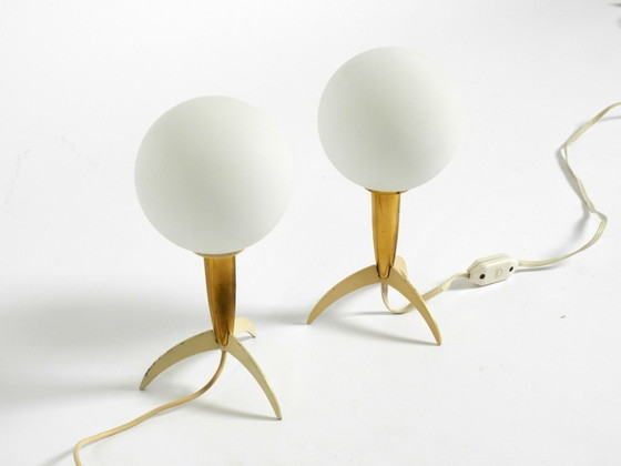 Image 1 of Two Mid-Century Modern rocket table lamps in brass and glass