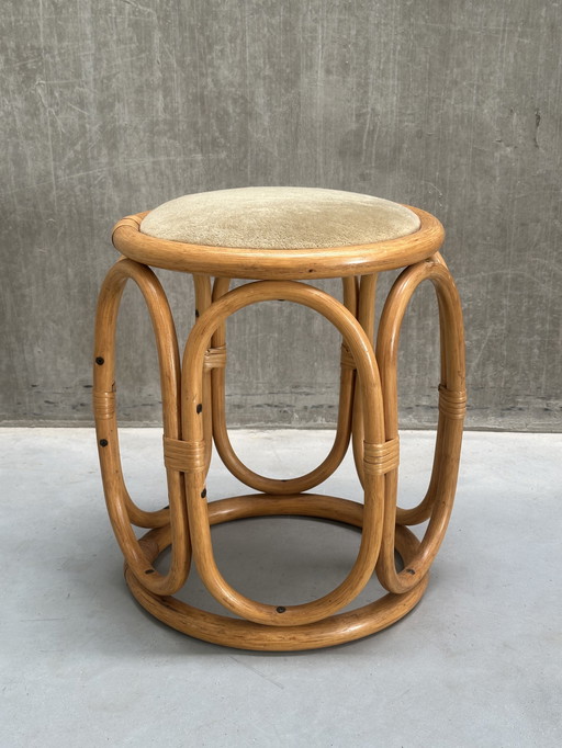Tabouret vintage en rotin avec assise en velours