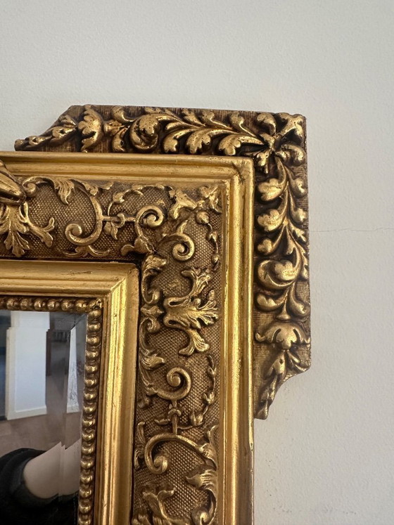 Image 1 of Specchio da parete antico francese in legno dorato con stemma di uccello e alloro, XIX secolo.