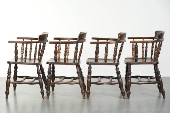 Image 1 of 4 x Antique wooden English pub/captain chairs from the late 19th century with character