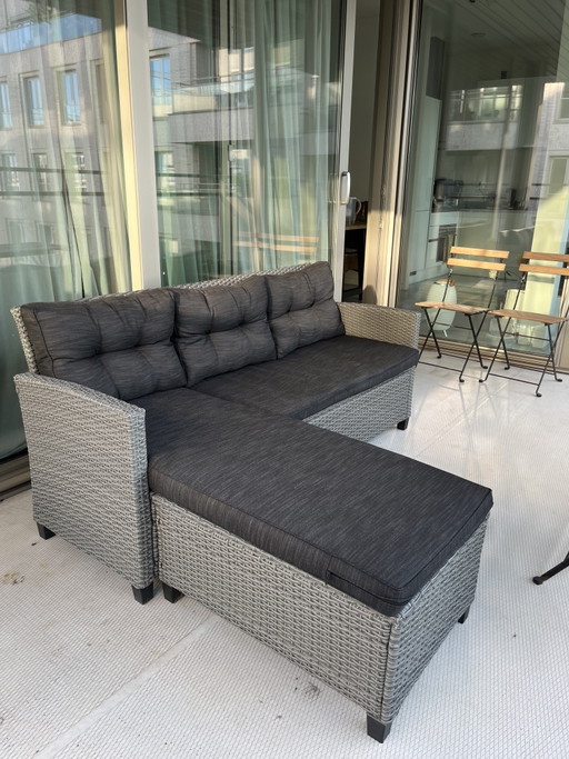 Outdoor lounge sofa with chaise longue