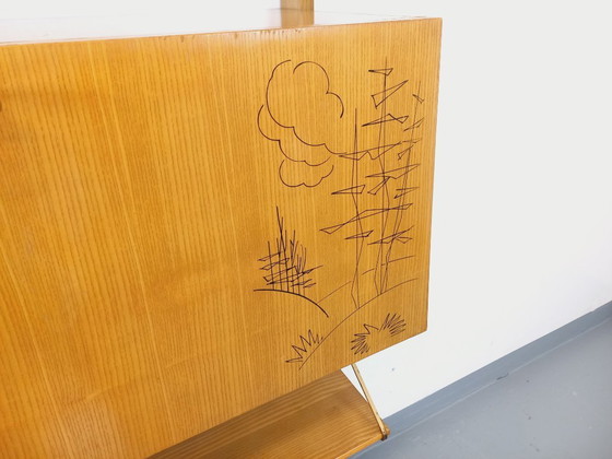 Image 1 of Wall-mounted bookcase with vintage light wood and brass secretary bar, dating from the 1960s
