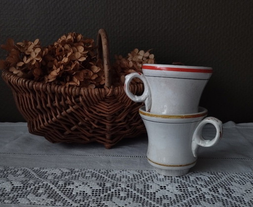 Een paar Sarreguemines ondoorzichtige porseleinen vuurkorfjes (1857-1900)