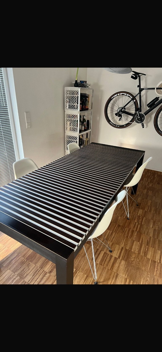 Image 1 of Black extendable dining table