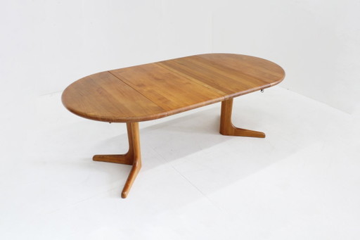 Vintage Danish round extendable dining table, solid teak