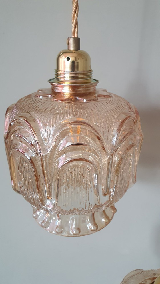 Image 1 of Set of 2 Vintage textured rose / amber tinted pendant lamps - mid-century design.