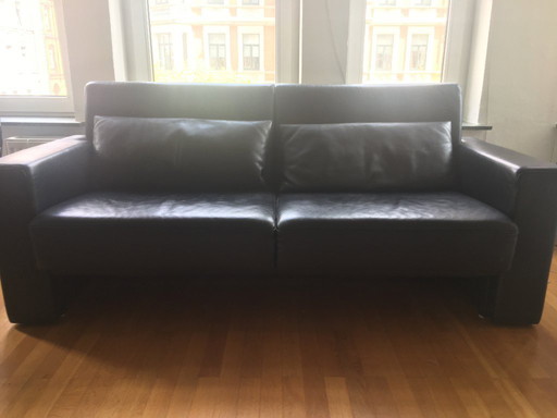 Black leather sofa (sofa bed), 2 matching armchairs