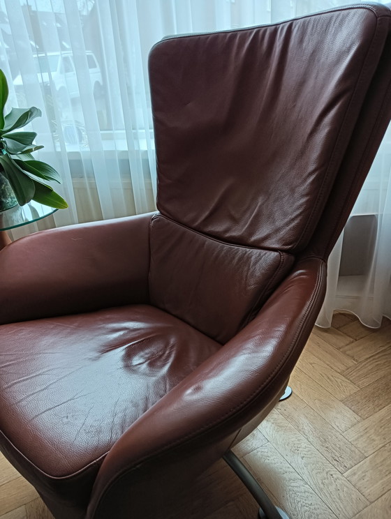 Image 1 of 2 leather armchairs for sale, 360° swivel, beautiful metal base