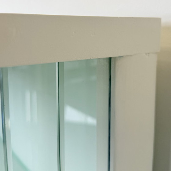 Image 1 of White vintage slatted display case on gold legs
