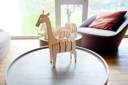 Giraffe-shaped wooden decoration by Ulap design