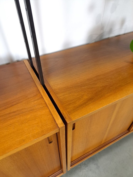 Image 1 of Parete componibile Omnia, Hilker, teak e acciaio nero con ripiani e contenitori