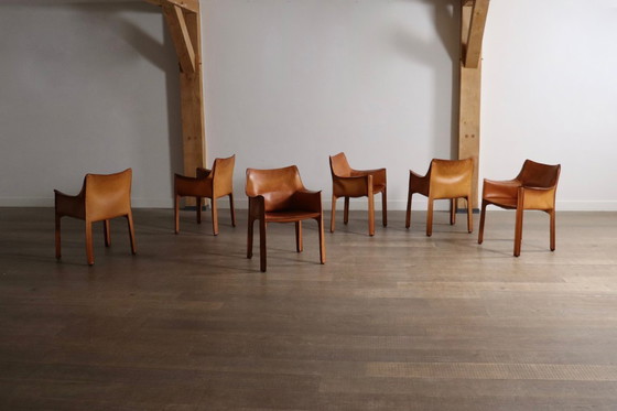 Image 1 of 6er-Set Cassina CAB Esszimmerstühle mit Armlehnen in cognacfarbenem Leder von Mario Bellini, Italien, 1970er Jahre