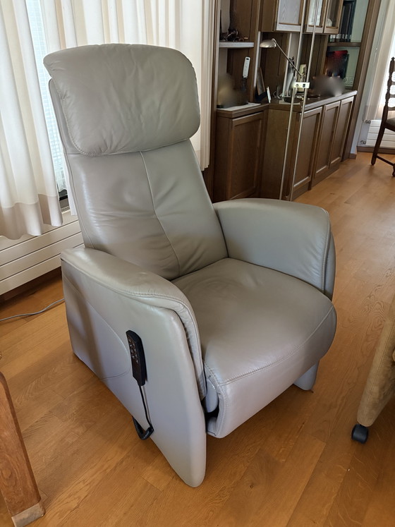 Image 1 of Hukla leather recliner, electrically operated