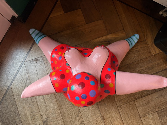 Image 1 of Lady in an orange dress by Trijnie Wubbolt