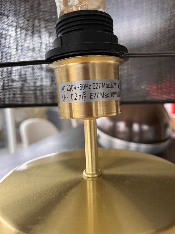 Image 1 of table lamp, gold metal and black jute