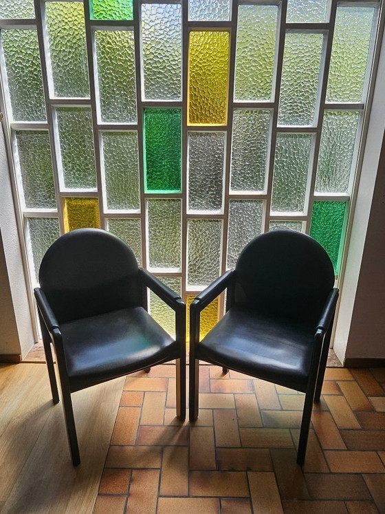 Image 1 of Ensemble de 6 (+2) chaises design Bulo – Cuir noir et bois – Années 1980