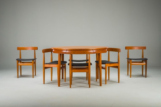 Image 1 of Mesa de comedor extensible y sillas danesas de teca de Hans Olsen para Frem Røjle, años 60, juego de 7