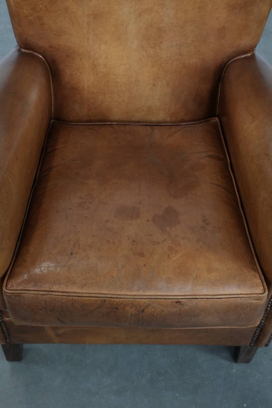 Image 1 of Vintage schapenleren fauteuil/ armchair met prachtige en warme kleuren