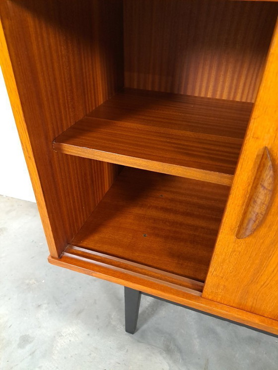 Image 1 of Armario de pared de teca con cajones, barra y patas negras