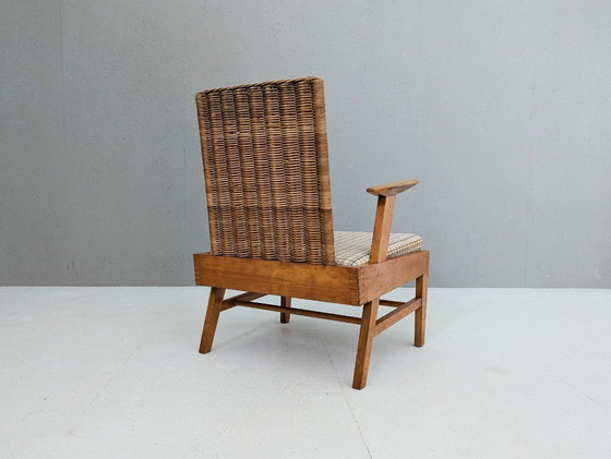 Image 1 of Skulpturaler Sessel aus Buche und Rattan mit Fußhocker von ÚĽUV, 1960er Jahre