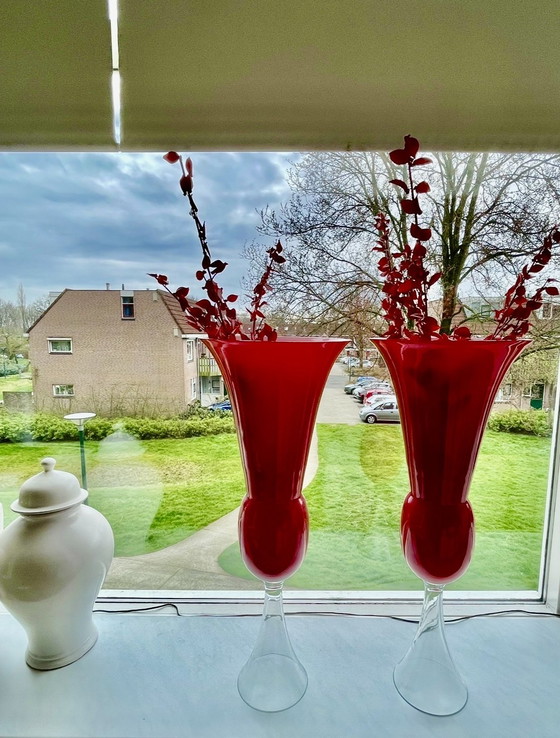 Image 1 of 2 red and white vases with 5 decorative branches made of glass