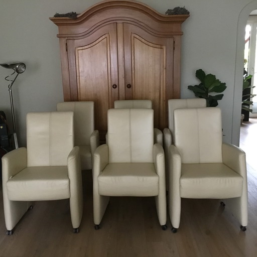 For sale 6 leather dining room chairs.