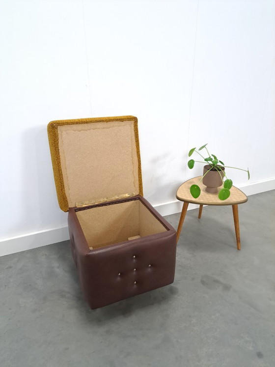 Image 1 of Ottoman with lid on chrome wheels