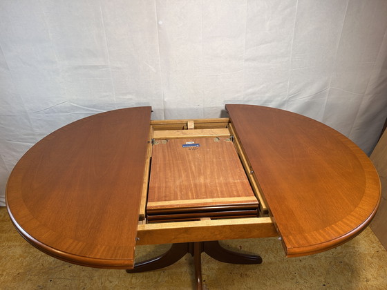 Image 1 of Mid-Century Retro Vintage Teak Extending Round Dining Table by Parker Knoll – 1970  Elegant | Space-Saving | Practical | Iconic 