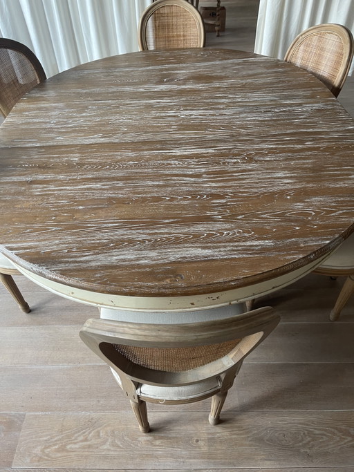 Uitschuifbare eiken kloostertafel met 6 stoelen
