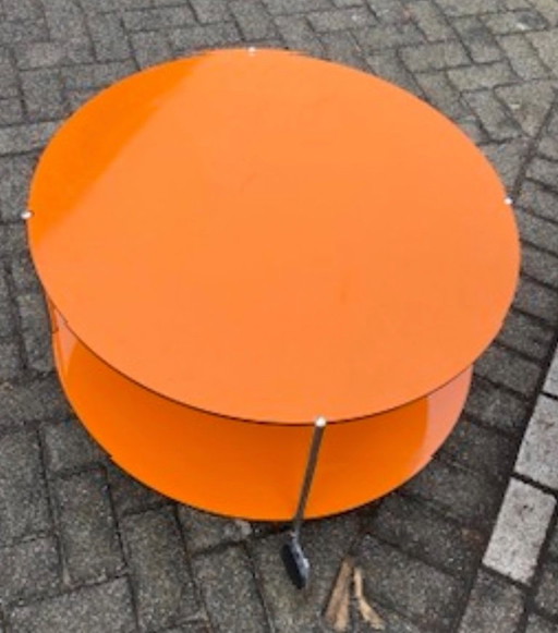 Ronde oranje salontafel met twee bladen