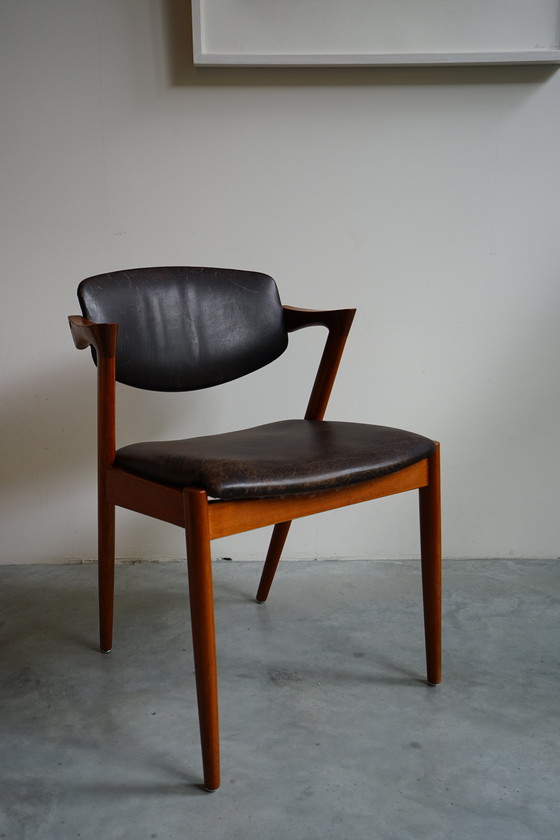 Image 1 of 6 Kai Kristiansen stoelen | Model 42 | Teak Leder patina