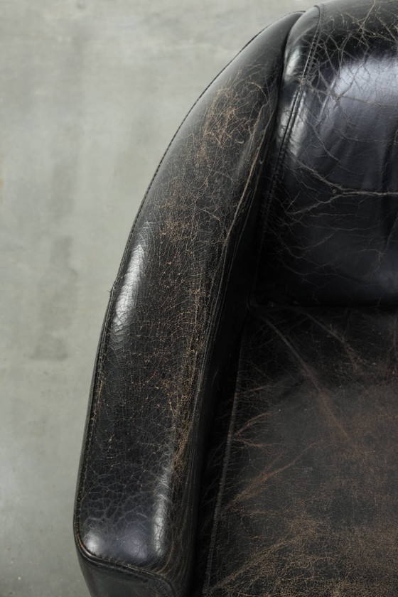 Image 1 of 2x rugged black vintage cowhide Aviator design armchairs with a distinctive look