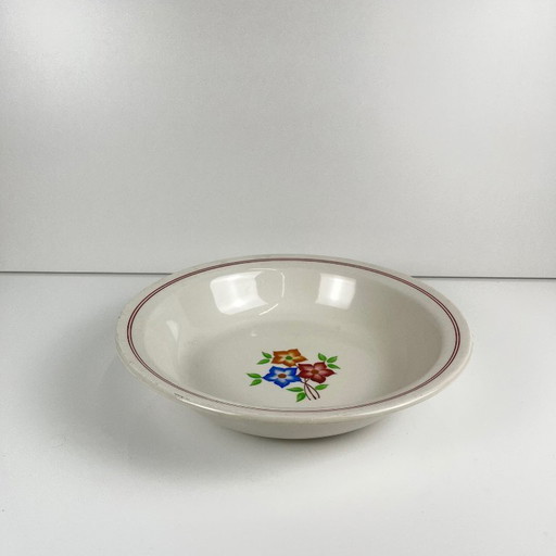 Piatto rotondo con bordo "L'alveare", Moulins des Loups, XX secolo